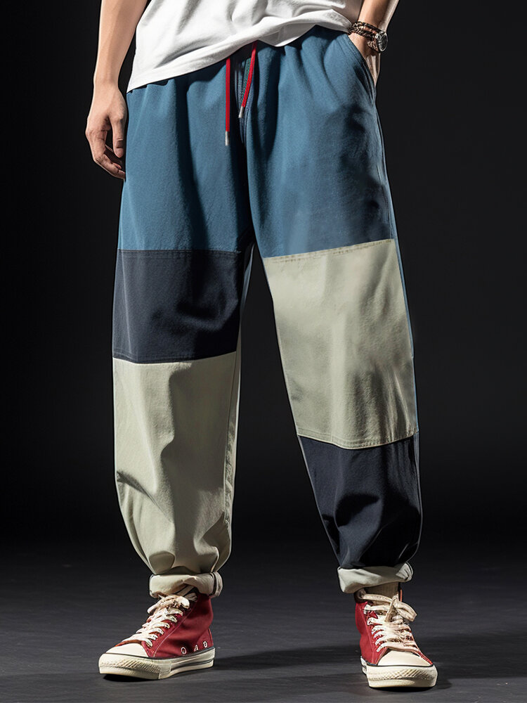 Pantalon ample décontracté avec cordon de serrage et patchwork de blocs de couleurs pour hommes