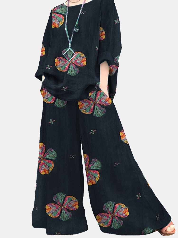 Zweiteiliger Anzug mit Blumendruck und Taschen und langen Ärmeln