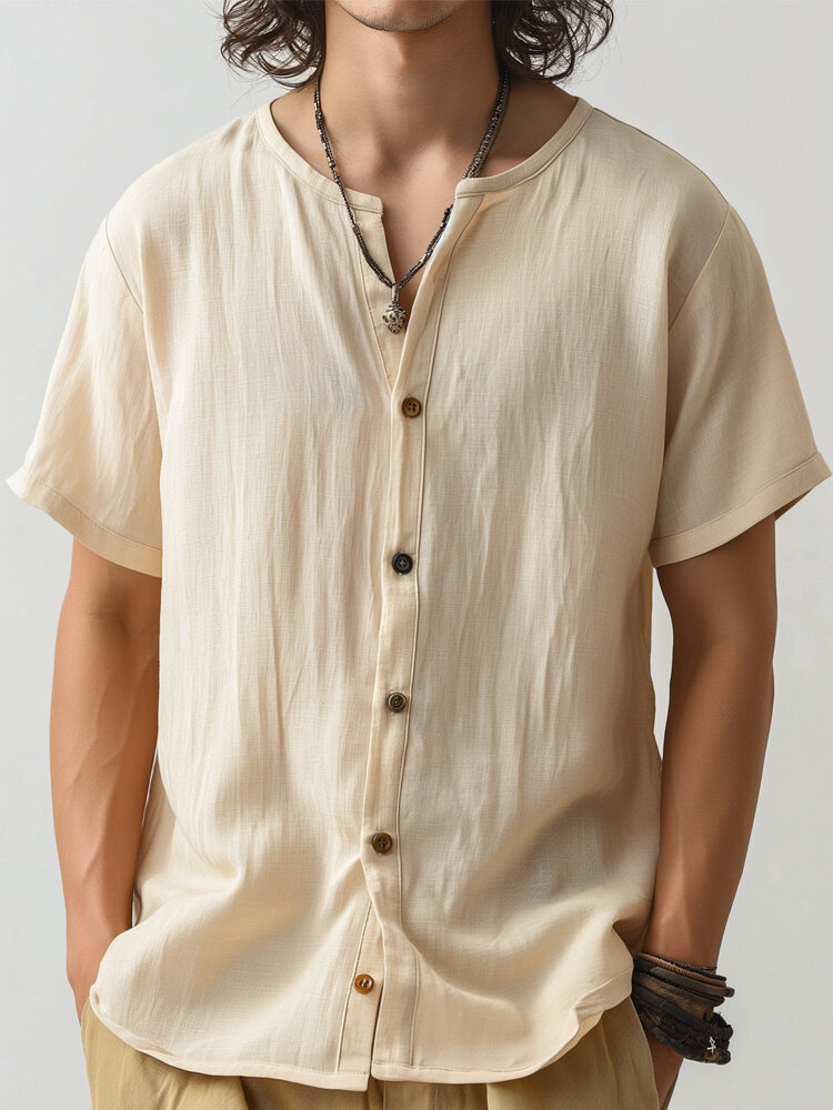 Chemise à manches courtes à col rond et texture de couleur unie pour hommes
