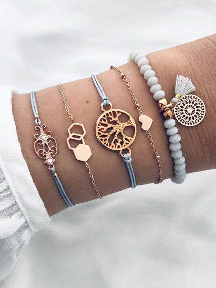 Set di braccialetti intrecciati con perline geometriche con ciondolo a nappa alla moda