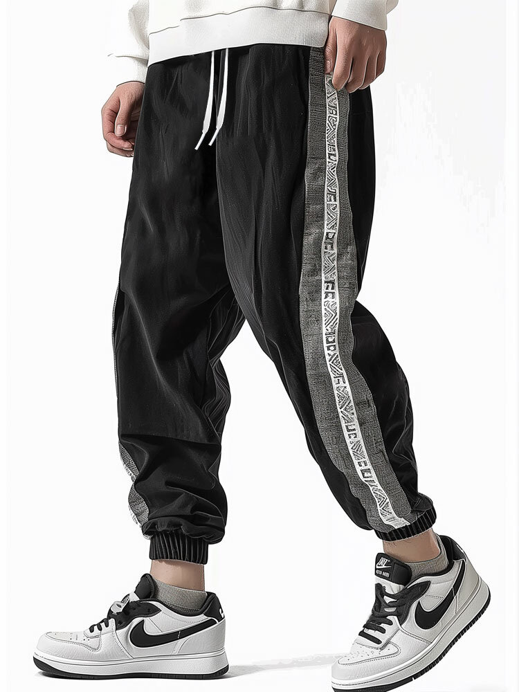 Pantalon ample à cordon de serrage en patchwork à motif géométrique pour hommes