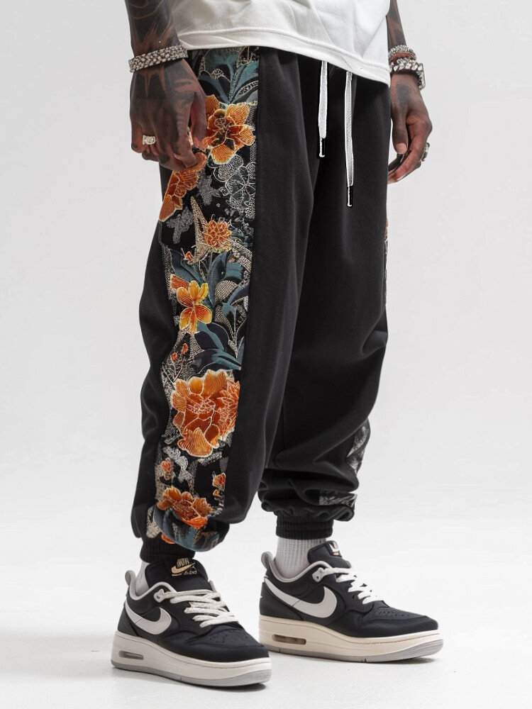 Cintura holgada con cordón y patchwork con estampado lateral floral para hombre Pantalones