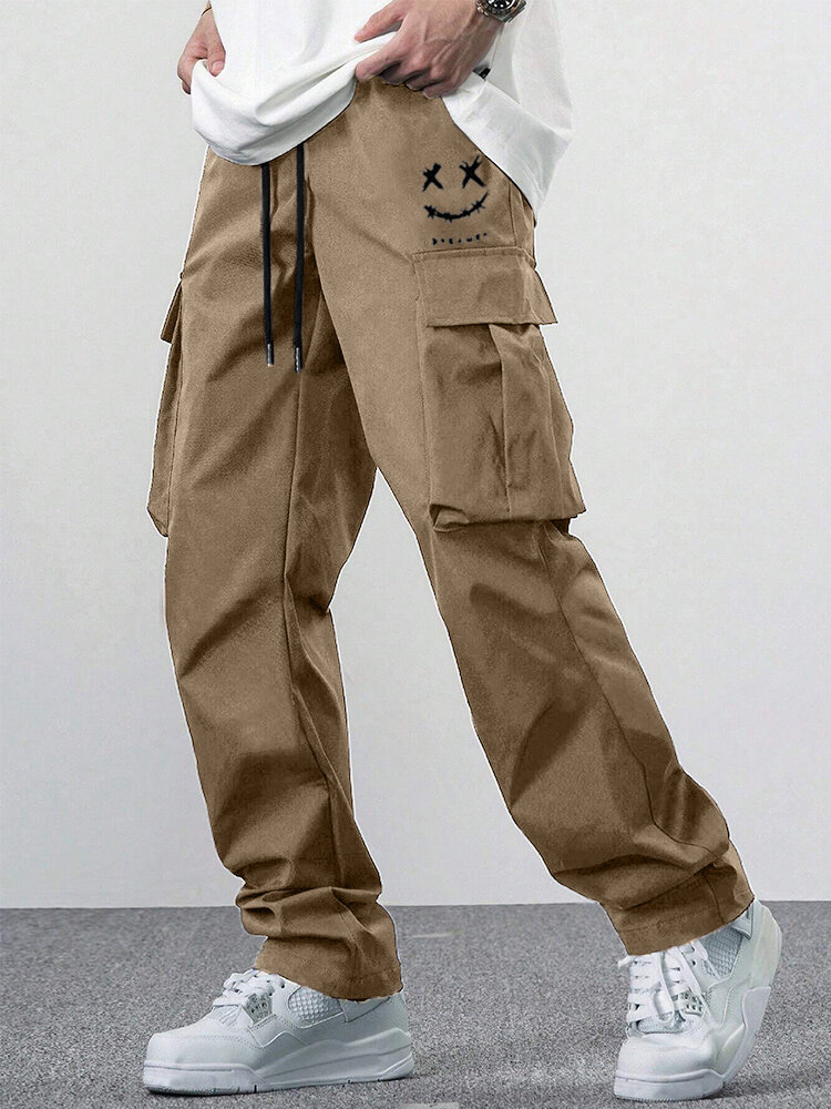 Pantalon cargo ample imprimé sourire à la taille avec cordon de serrage pour hommes