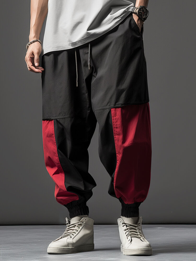पुरुषों के रंग ब्लॉक पैचवर्क लूज़ कैज़ुअल ड्रॉस्ट्रिंग कमर पैंट शीतकालीन