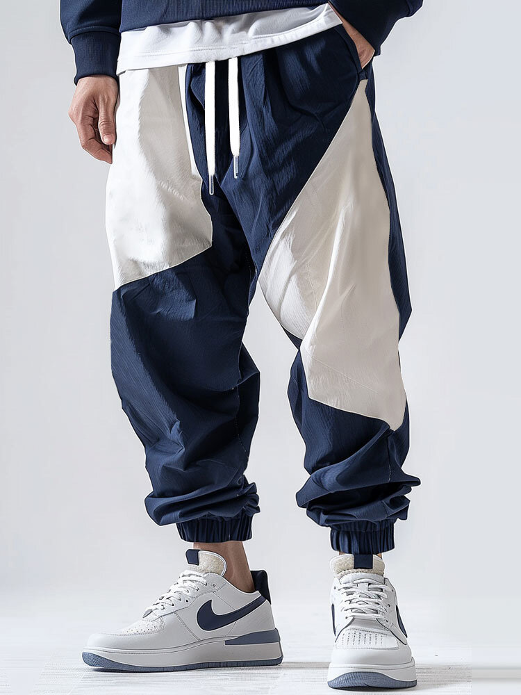 Pantalon ample à taille avec cordon de serrage et patchwork de blocs de couleurs pour hommes