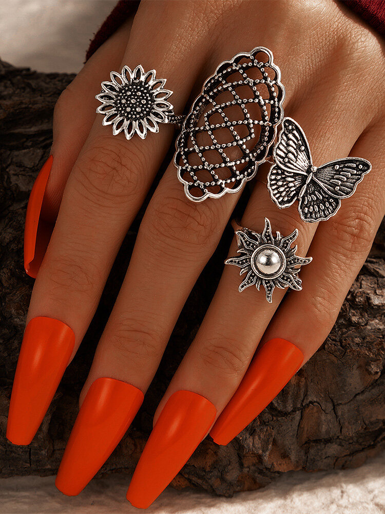 Set di anelli in lega di forma geometrica cava con fiore di farfalla di girasole vintage alla moda vintage