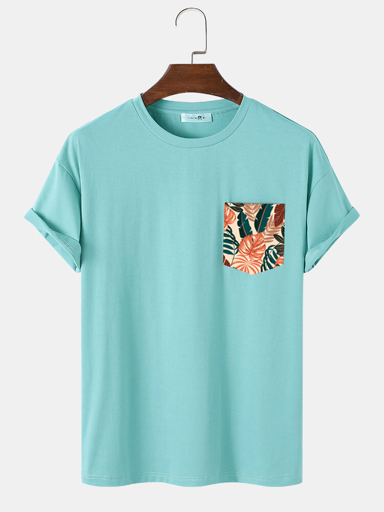 T-shirt casual a maniche corte con stampa tascabile sul petto con foglie tropicali da uomo
