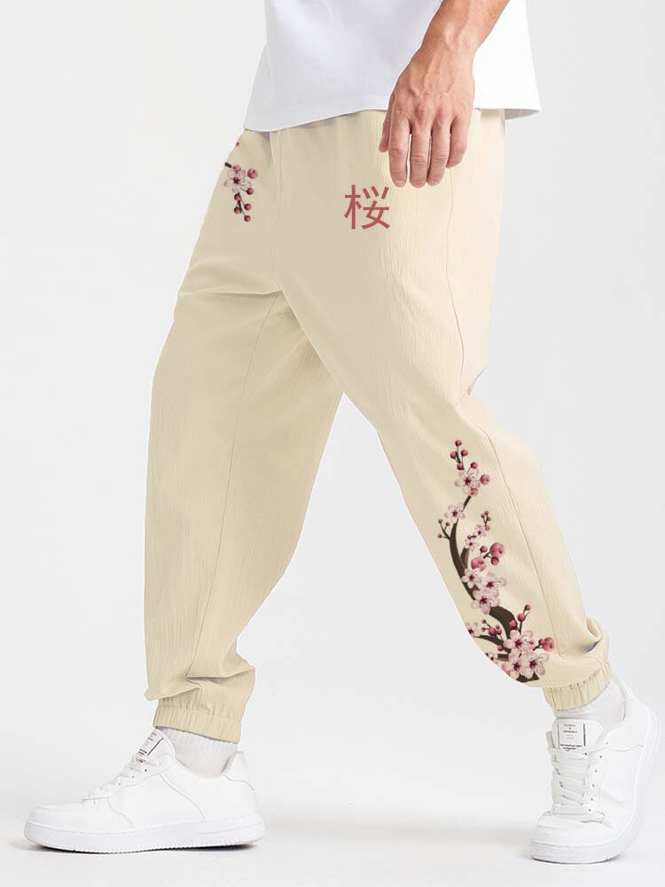 

Mens Japanese Cherry Blossom Print Loose Elastic Cuff Pants, Apricot