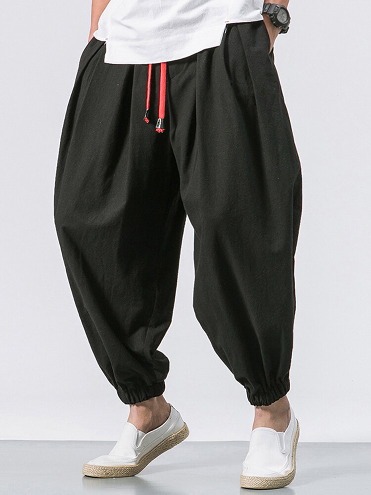 Pantalon bouffant ample en couleur pure en coton à cordon de serrage pour homme