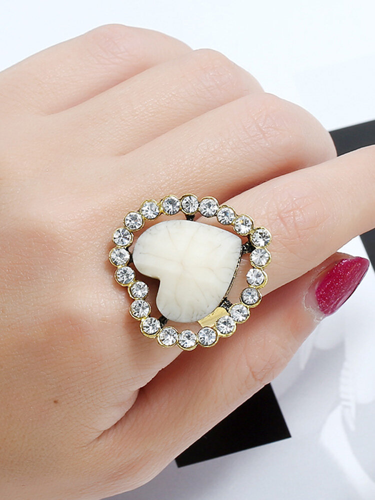 Melocotón estereoscópico geométrico vintage Corazón Anillo Anillo de dedo abierto de diamantes de imitación hueco de metal 