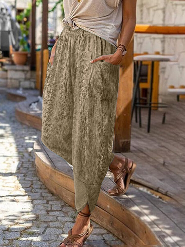 Women Solid Asymmetrical Hem Dual Pocket Casual Pants