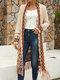 Nomadic Tribal Pattern Pocket Long Sleeve Tassel Knit Cardigan - Apricot