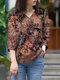 Damen-Bluse mit Allover-Blumendruck und V-Ausschnitt aus Baumwolle mit geteiltem Saum - Rosa