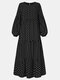 فستان ماكسي مرقع بأكمام طويلة وياقة دائرية وطبعة منقّطة - أسود