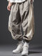 पुरुषों के कलर ब्लॉक पैचवर्क इलास्टिक कफ लूज ड्रॉस्ट्रिंग कमर पैंट - खुबानी