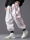 メンズ 日本の桜プリント ドローストリングウエスト ポケット付きパンツ - 白い