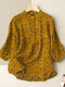 Blusa feminina gola 3/4 com estampa floral e botão manga - Amarelo