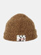 Unisex Teddy Velvet Solid Color Cow Pattern Letter Cloth Label Warmth Beanie Hat - Brown