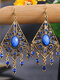 Vintage Bohemian Hollow Carved Rhombus Inlaid Rhinestone Alloy Earrings - Royal Blue