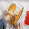 Large Size Women Canvas Solid Color Round Toe Casual Flat Sneakers - Yellow