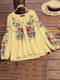 Damen-Bluse mit Blumendruck, Stehkragen, halber Knopfleiste und langen Ärmeln - Gelb