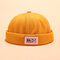 Men Women Cotton Solid Color Brimless Hats Skull Caps With Chinese Letters - Yellow