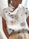 Blusa de manga corta con botones y estampado floral para mujer Cuello Diseño - Blanco