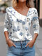 Damen-Bluse mit Aquarell-Blumendruck, unregelmäßigem Ausschnitt, Knopfdetail - Weiß