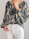 Blusa de manga larga con botones y estampado de flores en toda la prenda - azul