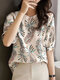 Camiseta feminina com estampa paisley étnica decote careca meia manga - Damasco