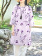 Lang geschnittene Bluse mit seitlichem Schlitz und 3/4-Ärmeln für Damen mit floralem Pflanzendruck - lila