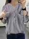 Blusa de manga larga con botones en el frente y bolsillo texturizado a rayas - Negro