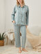 Conjunto de pijama liso con dobladillo alto y bajo con botones de satén a rayas para mujer - azul