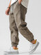 पुरुषों के लिए सॉलिड कैज़ुअल लूज़ ड्रॉस्ट्रिंग कमर पैंट पॉकेट के साथ - भूरा