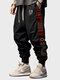 Pantalon ample avec cordon de serrage à motif ethnique géométrique pour hommes - Noir