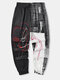 मेन्स एब्सट्रैक्ट फेस लेटर प्रिंट पैचवर्क इलास्टिक वेस्ट लूज पैंट - काली