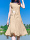 Damen-Kleid aus Baumwolle mit Blumenstickerei, V-Ausschnitt und Rüschensaum, ärmellos Kleid - Aprikose