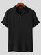 Kurzärmliges Herren-Golfshirt aus geripptem Strick mit Viertelreißverschluss - Schwarz