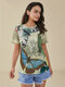 Lässiges Kurzarm-T-Shirt mit Schmetterlings-Blumengrafik und Rundhalsausschnitt - Grün