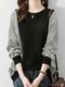 Lockeres Langarm-Sweatshirt mit Rundhalsausschnitt und Streifen in Kontrastfarbe - Schwarz