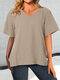 Camiseta de manga corta con cuello en V y dobladillo alto-bajo liso para mujer - Albaricoque