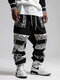 Pantalon ample patchwork à motif géométrique ethnique pour hommes - Noir