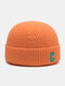 Unisex Knitted Solid Color C Letter Embroidery All-match Warmth Brimless Beanie Hat - Orange