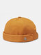 Unisex Polyester Cotton Solid Color Anchor-shaped Metal Label Brimless Beanie Landlord Cap Skull Cap - Yellow