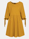 Mini vestido casual feminino de cor sólida com decote em O, manga comprida atada - Amarelo