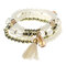 4 piezas / juego de pulseras de perlas de vidrio con borla de cristal Colgante Paquete de pulseras para Mujer - blanco