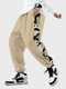 पुरुष पांडा साइड प्रिंट पैचवर्क कैज़ुअल ड्रॉस्ट्रिंग कमर पैंट शीतकालीन - खुबानी