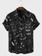 पुरुषों के लिए ऑलओवर फनी स्माइल फेस प्रिंट फ्लैप पॉकेट शॉर्ट स्लीव शर्ट - काली