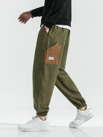 Pantalon en velours côtelé avec poches contrastées