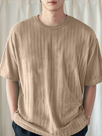 Camisetas holgadas con cuello redondo y textura sólida Cuello